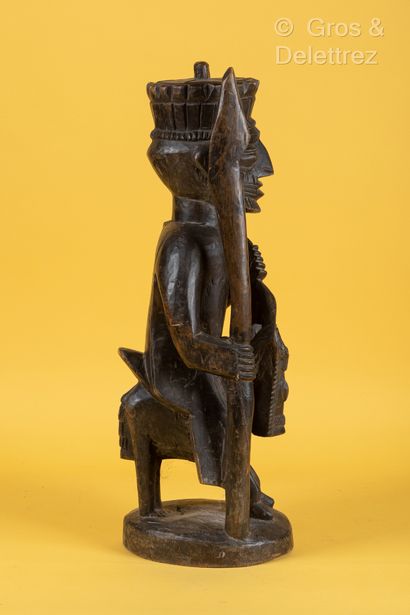 Style MALI Sculpture in patinated wood representing a lord on horseback and carrying...
