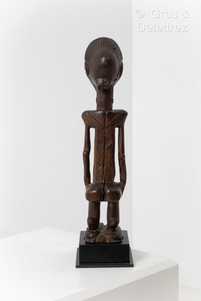 null Male statue.
Baule people, Ivory Coast.
Wood with a slightly crusty patina,
native...