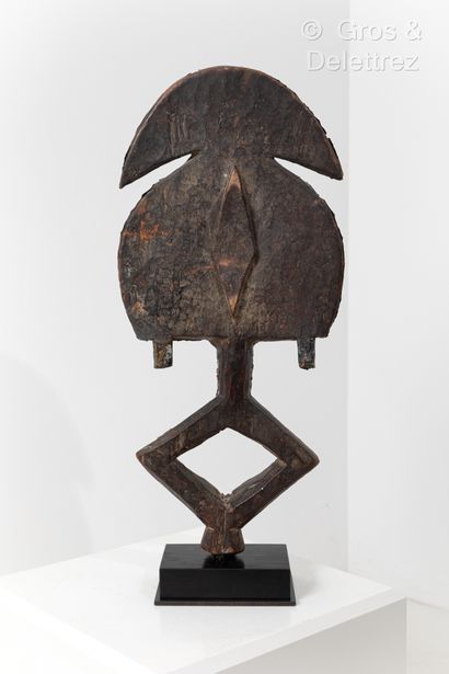 null Reliquary figure.
Kota people, Gabon.
Wood, copper and brass.
Late 19th century.
Height:...