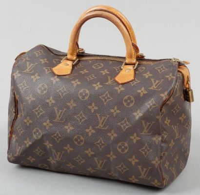 Louis VUITTON Sac "Speedy", 30 cm, en toile monogram et cuir naturel, fermeture éclair,...