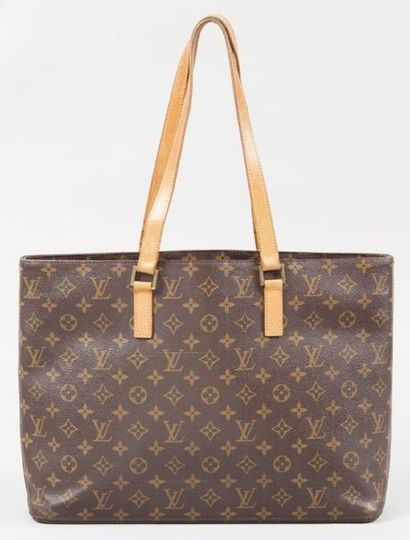 Louis VUITTON Sac "Luco" en toile monogram et cuir naturel, fermeture éclair, deux...