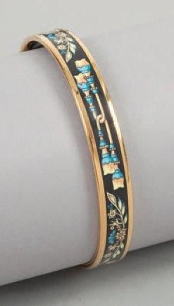 HERMÈS Paris Bracelet jonc en métal doré émaillé à décor d'embrases(*)