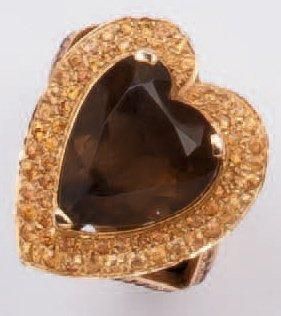 MAUBOUSSIN Bague «Coeur» en or jaune ornée d'un quartz fumé taillé en coeur dans...