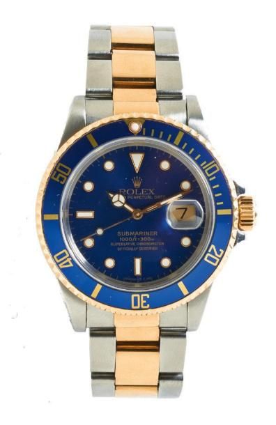 ROLEX SUBMARINER ref: 16613 Vers 1991 Montre bracelet de plongée en or et acier....