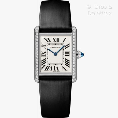 null Cartier Tank Must watch, large model, quartz movement, offered by Maison Auberi.
Steel...