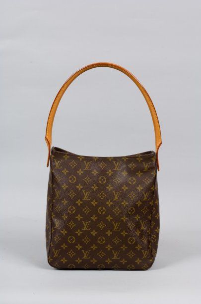 LOUIS VUITTON Sac looping en toile monogram, fermeture éclair, demies anses bandoulières...