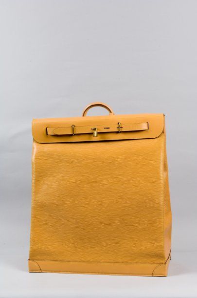 LOUIS VUITTON Steamer bag en cuir épi beige, fermeture par pattes et cadenas, poignées...
