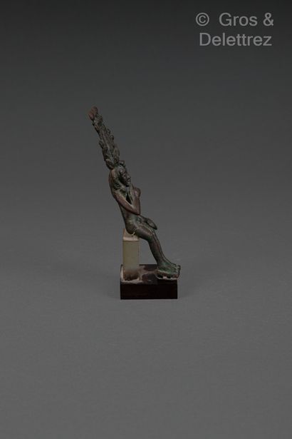 null Statuette of a nude Harpocrates, seated. He holds out his index finger to his...