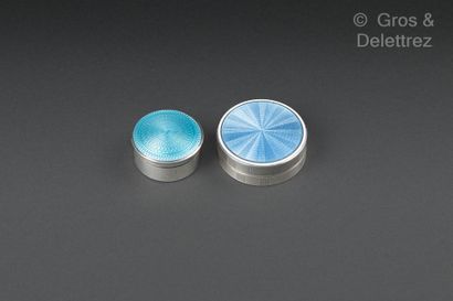 null Set of three circular boxes, the first in 9K gold, the blue enameled lid surrounding...