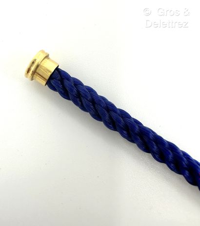 FRED Câble en acier bleu, embouts en acier doré. Signé. Tour de poignet : 16cm.