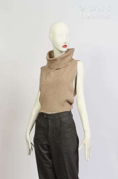 null ALAIA, PRADA - Outfit featuring a taupe cashmere open top with funnel neck and...