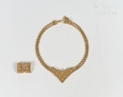 null Christian DIOR - Half-set in beaded gold metal, partially strassed, consisting...