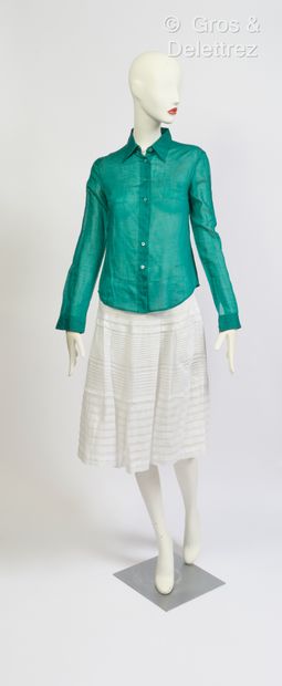 null MIU MIU, PRADA - Cotton voile set with emerald shirt and white ruffled skirt....