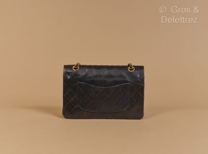 null CHANEL Circa 1990 - "Classique" 25 cm bag in black quilted lambskin leather,...