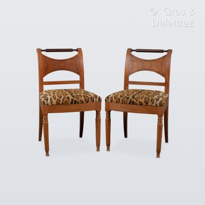 null French work
Pair of neoclassical molded wood chairs with scrolled backs and...