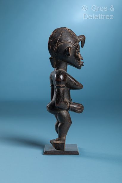 null Senoufo, Ivory Coast
Female statuette
Wood with black patina
Late 19th - early...
