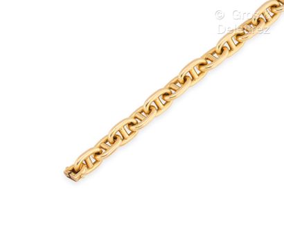 Travail français Bracelet Vintage en or jaune 750 millièmes à maille marine. Fermoir...