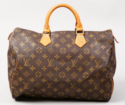 LOUIS VUITTON Sac «Speedy» 35 cm en toile monogram et cuir naturel, fermeture éclair,...