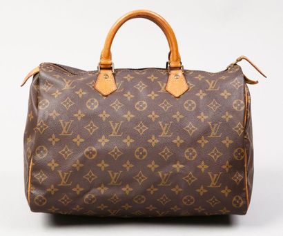 LOUIS VUITTON Sac «Speedy» 35 cm en toile monogram et cuir naturel, fermeture éclair,...