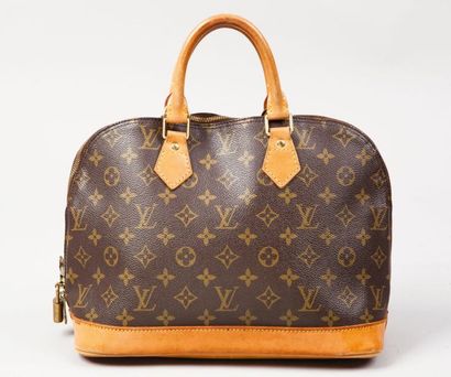 LOUIS VUITTON Sac «Alma» en toile monogram et cuir naturel, fermeture éclair, double...