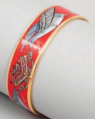 HERMES paris made in Austria Bracelet jonc, en métal doré émaillé à motif de pigeons...