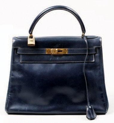 HERMES Paris Sac "Kelly" 28 cm en cuir marine, attaches et fermoir plaqué or, poignée,...