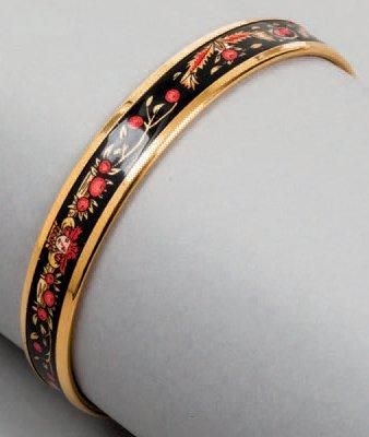 HERMES paris made in Austria Bracelet jonc en métal doré et émail multicolore à motif...