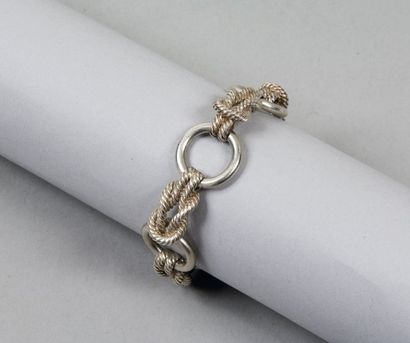 HERMES Paris *Bracelet en argent figurant des noeuds marins striés retenus par des...