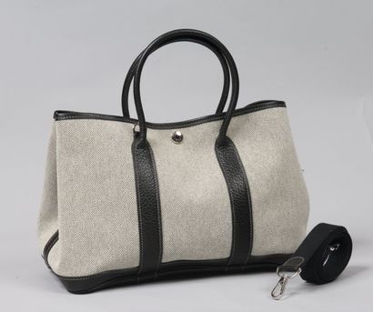 HERMÈS Paris made in France *Sac « Garden « en toile chinée beige et cuir grené noir,...