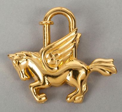 HERMÈS Paris made in France Porte-clef "Pégase" en métal doré.