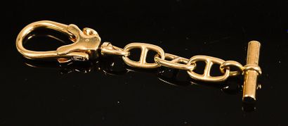 HERMES PARIS. Porte-clés en or jaune à chaîne...