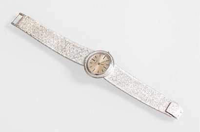 PIAGET: Bracelet montre de dame en or gris....