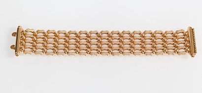 null Bracelet articulé en or jaune mat et poli. P. 59,3 g.