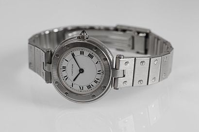 null CARTIER "Santos". Bracelet-montre en acier, cadran rond, mouvement quartz, bracelet...