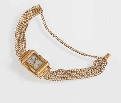 SUIZEX. Bracelet - montre de dame en or jaune,...