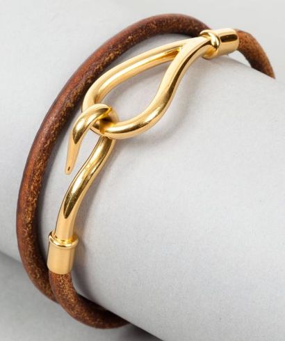 HERMÈS Paris made in France Bracelet "Jumbo" en cuir naturel, fermoir en métal doré....