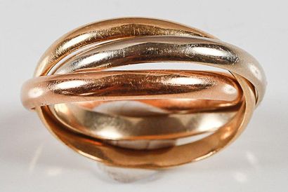CARTIER TRINITY. Alliance trois anneaux en or de trois couleurs signé Cartier. P....