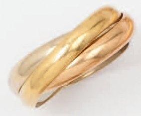 null Alliance trois anneaux en or de trois couleurs. Signée Cartier. Doigt 55. P....