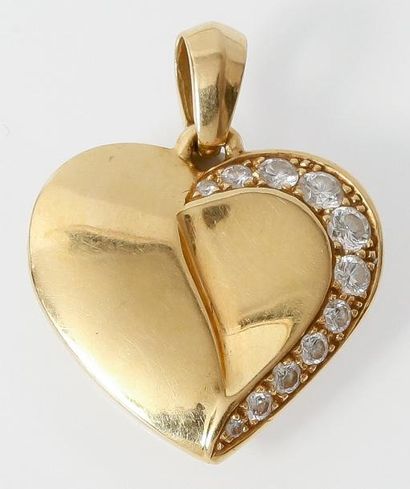null Pendentif «Coeur» en or jaune orné de diamants taillés en brillant. P. 5,2g
