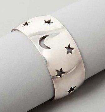 HERMÈS Paris made in France Large bracelet jonc ouvrant en argent repercé d'étoiles...