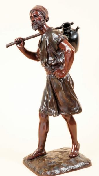 Marcel DEBUT (1855-1933 (D'après) Le porteur d'eau Epreuve en bronze à patine polychrome,...