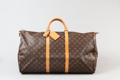 LOUIS VUITTON Sac "Keepall" 60 cm en toile monogram et cuir naturel, fermeture éclair,...