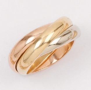 CARTIER TRINITY Bague trois anneaux en or de trois couleurs. Signée Cartier. Tour...
