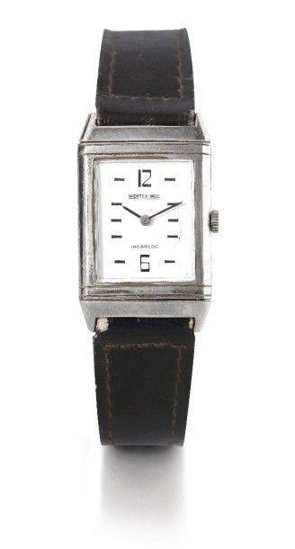 VERTEX-MEC vers 1980 Montre réversible en métal chromé. Boîtier rectangle. Cadran...