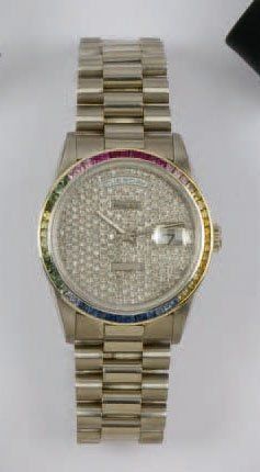 ROLEX Daydate Bracelet-montre en or gris cadran et lunette serti de diamants et pierres...