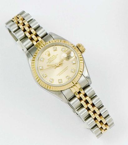 ROLEX «Oyster perpetual datejust» Bracelet-montre de femme en or jaune et acier,...