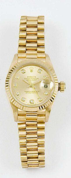 ROLEX «datejust» Bracelet-montre de femme en or jaune, cadran or avec index diamants,...