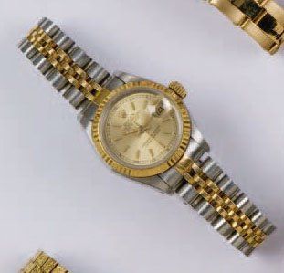 ROLEX O.P. D.J. Bracelet-montre de femme en or jaune et acier, cadran or, date, mouvement...