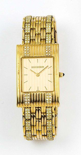 BOUCHERON «Reflet» Bracelet-montre de femme en or jaune, cadran or, la lunette sertie...