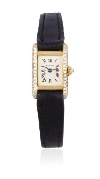 CARTIER MINI TANK n° 8280031533 vers 1990 Montre bracelet de dame en or. Boîtier...